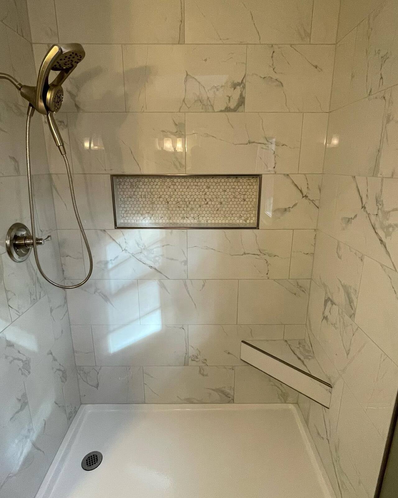 Complete Shower Remodel. New Tile and Hardware.