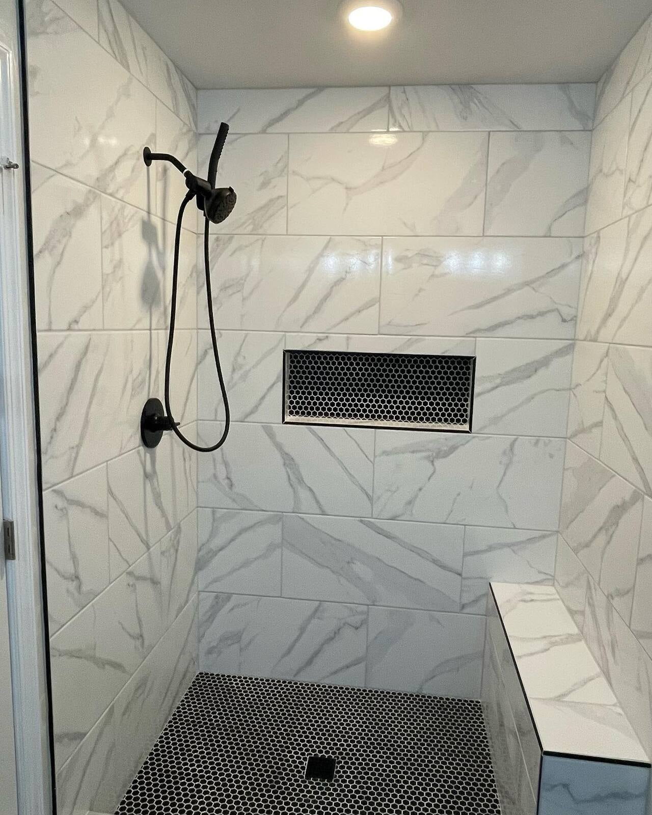 Shower Remodel. Tile, Shower Bench, and Hardware.