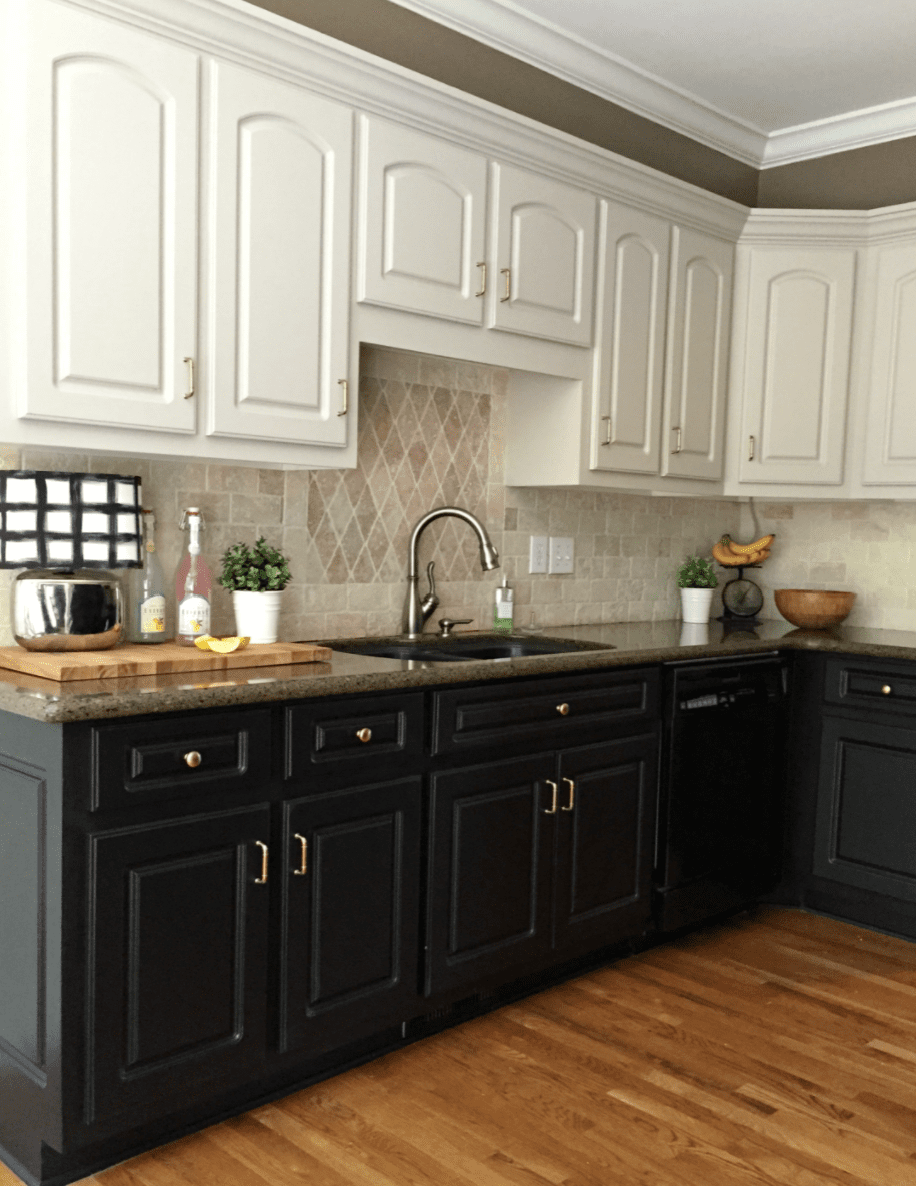Large kitchen with white cabinets and dark brown bottom cabinets.