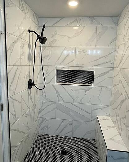 White marble shower remodel.