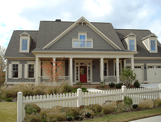 Exterior painting of house, dark green.